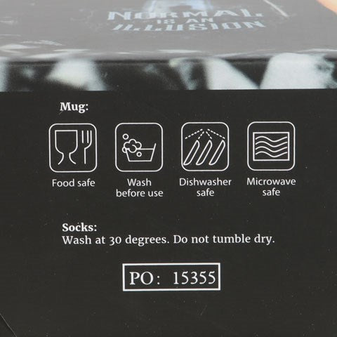 Mug + chaussettes " Normal is an illusion"